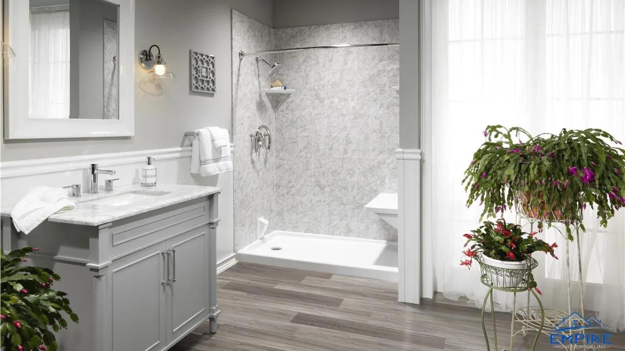 Walk-in shower with built-in seat and safety grab bars installed by Empire Home Remodeling in Milwaukee, WI