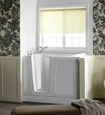 Walk-in tub and shower installation in Milwaukee, WI home by Empire Home Remodeling, providing safe and accessible bathing solutions