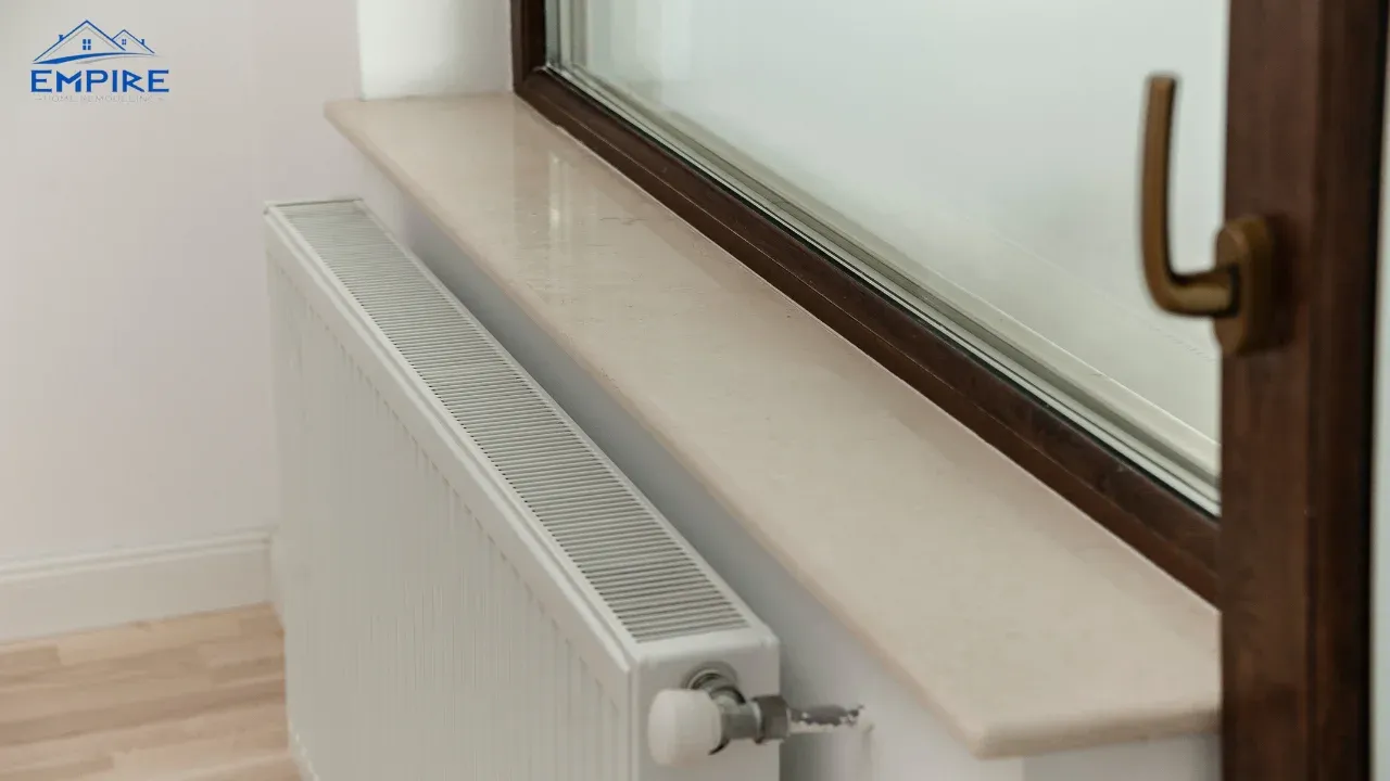 Homeowner comparing DIY window installation versus professional window installer services by Empire Home Remodeling in Milwaukee, WI